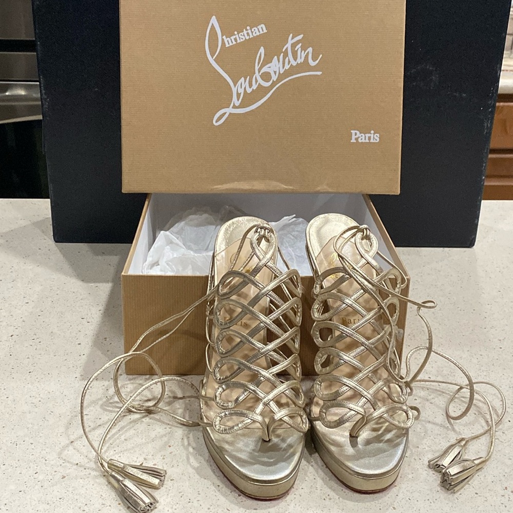 Stunning metallic Christian Louboutin ankle wrap platform heels.